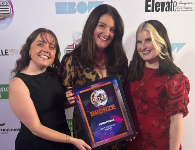 Creative Agency team Lorg Media posing with their bronze award at the Digital Media Awards